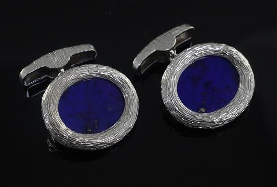 A pair of textured 18ct white gold and lapis lazuli oval cufflinks, 22mm.